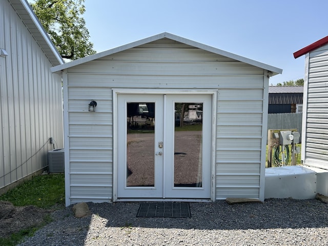 11240 Mohawk Path, Lakeview, OH 43331 - view of outdoor structure featuring french doors and central AC unit