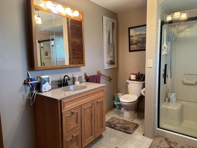 5062 Mercer Van Wert County Line Rd, Rockford, OH 45882 - bathroom featuring a stall shower, vanity, tile patterned floors, and a textured ceiling