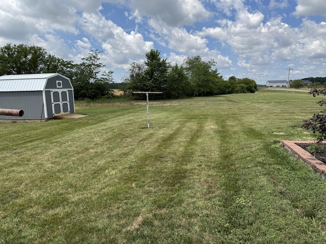 5062 Mercer Van Wert County Line Rd, Rockford, OH 45882 - view of green lawn featuring a storage unit