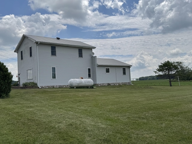 5062 Mercer Van Wert County Line Rd, Rockford, OH 45882 - rear view of house with a yard and a metal roof