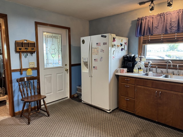 5062 Mercer Van Wert County Line Rd, Rockford, OH 45882 - kitchen with white refrigerator with ice dispenser, light countertops, and dark carpet