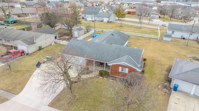 birds eye view of property with a residential view