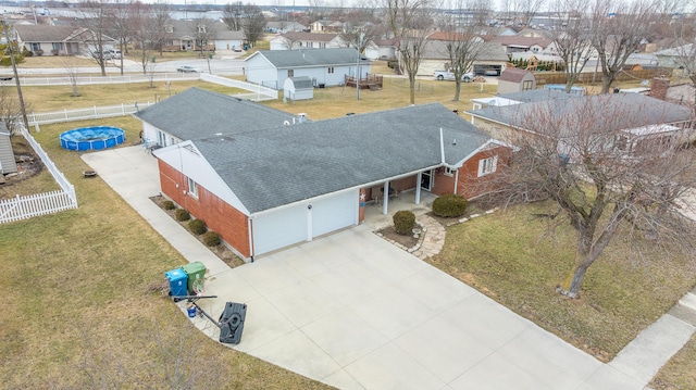 drone / aerial view with a residential view