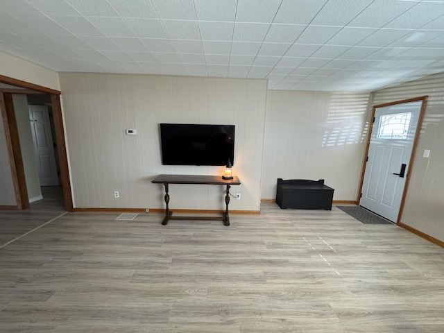 foyer with light hardwood / wood-style flooring