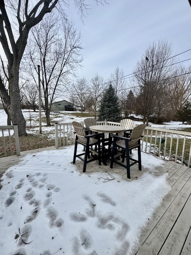 view of snow covered deck