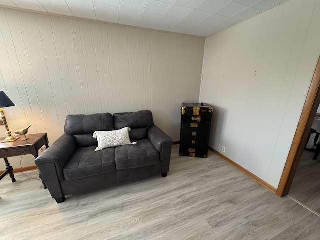 sitting room featuring light hardwood / wood-style flooring