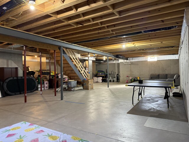 basement featuring stairway