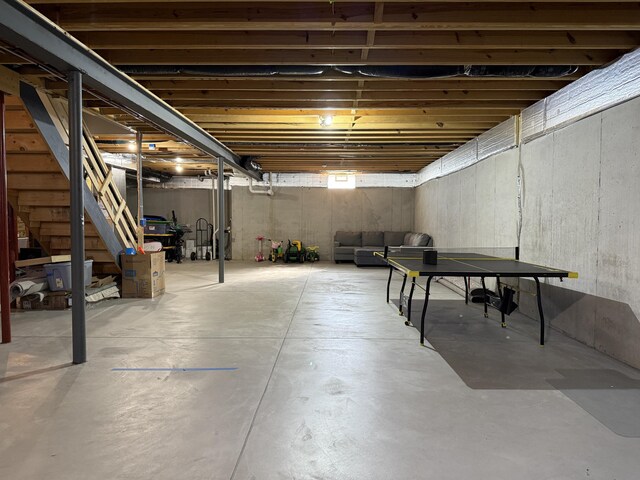 unfinished basement with stairway