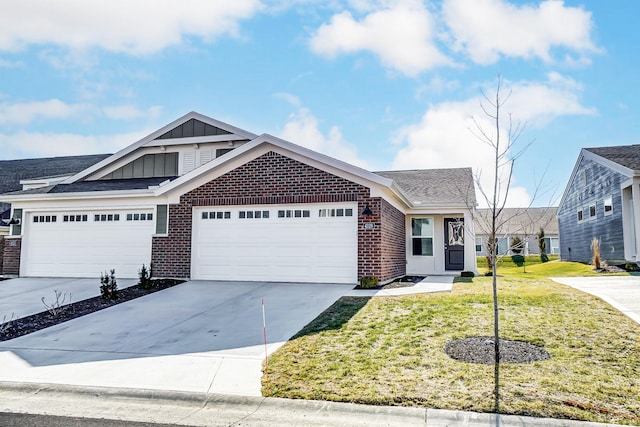 view of front facade with a garage and a front lawn