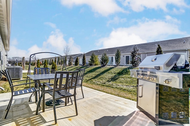 view of patio / terrace with area for grilling and central AC