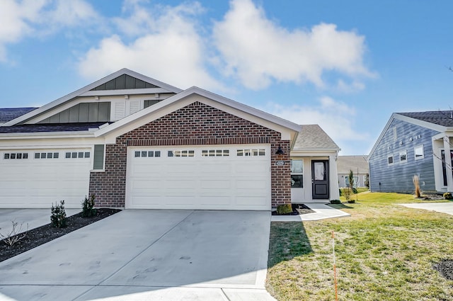 view of front of home featuring a garage and a front lawn