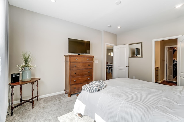 bedroom with light colored carpet