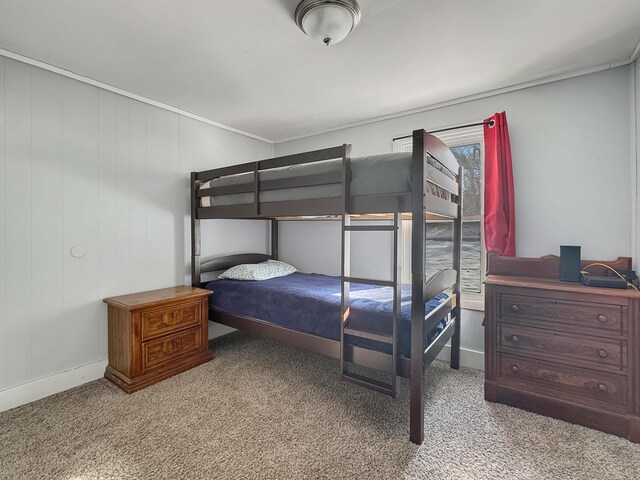 carpeted bedroom with baseboards