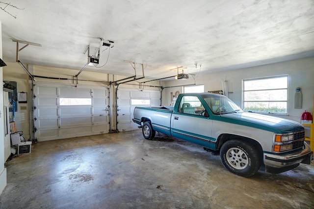 garage featuring a garage door opener