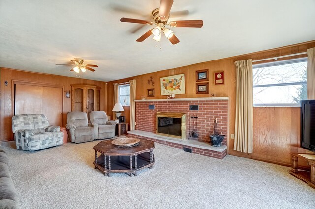 living room featuring wooden walls and carpet floors