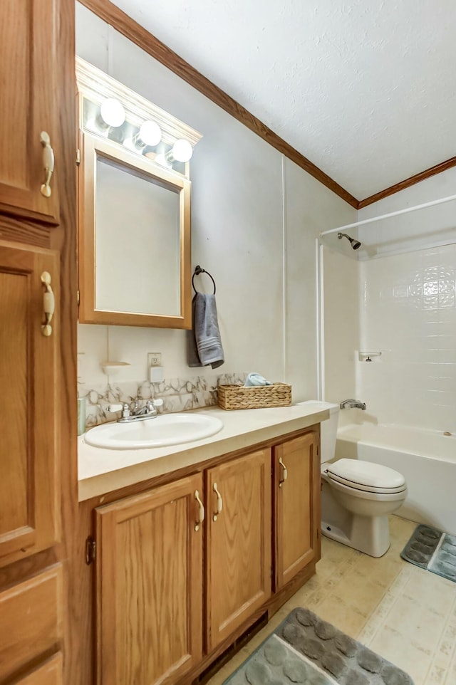 full bathroom with toilet, ornamental molding, vanity, and shower / tub combination