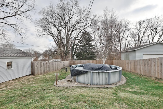 view of yard featuring a fenced backyard and a fenced in pool