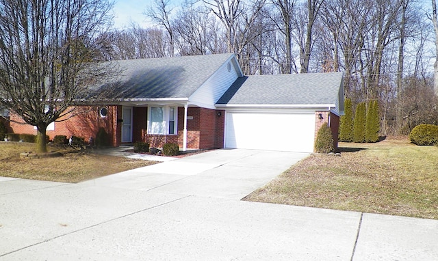 view of front of home with a garage and a front yard