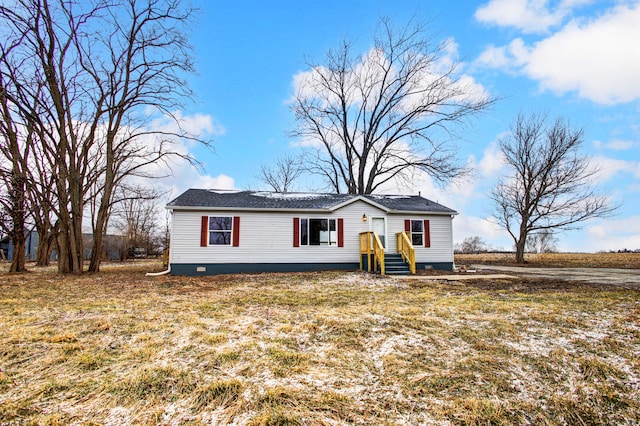 view of front of home with crawl space