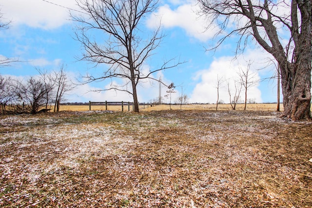 view of yard with a rural view