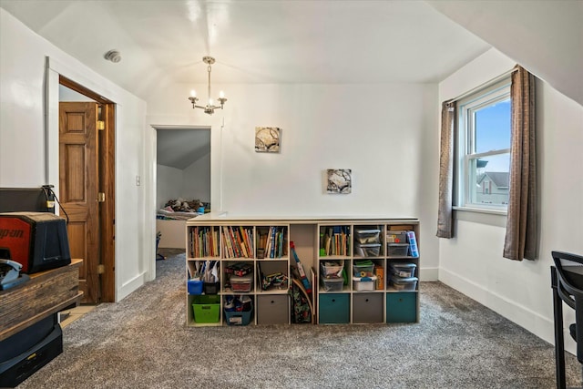 recreation room with baseboards, a notable chandelier, and carpet flooring