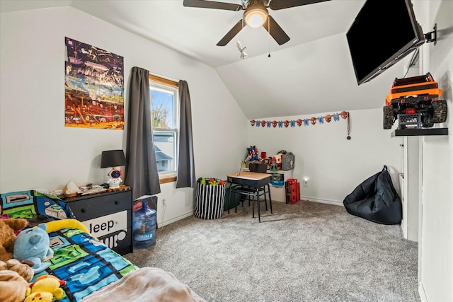 playroom with ceiling fan, carpet, and lofted ceiling