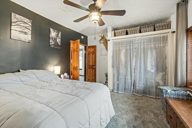 carpeted bedroom featuring a ceiling fan