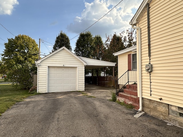 garage with a carport