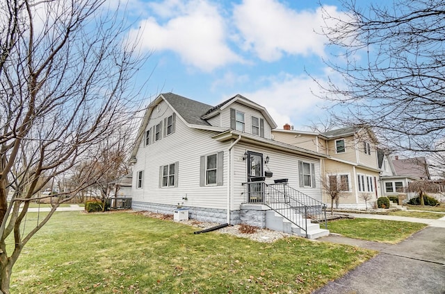 view of front facade with a front lawn