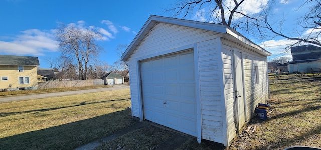 garage with a yard