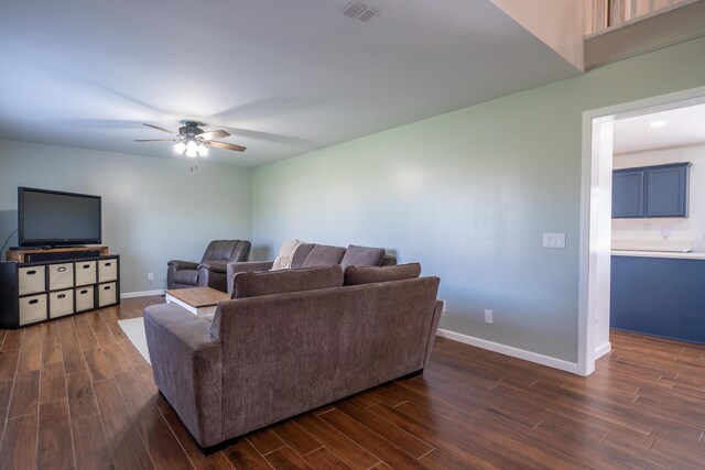 4100 Joshane St, Springfield, OH 45502 - living area featuring baseboards, visible vents, ceiling fan, and dark wood finished floors