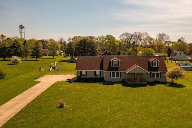 4100 Joshane St, Springfield, OH 45502 - cape cod-style house with covered porch, a front lawn, and concrete driveway