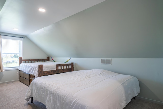 4100 Joshane St, Springfield, OH 45502 - carpeted bedroom featuring baseboards, vaulted ceiling, visible vents, and recessed lighting