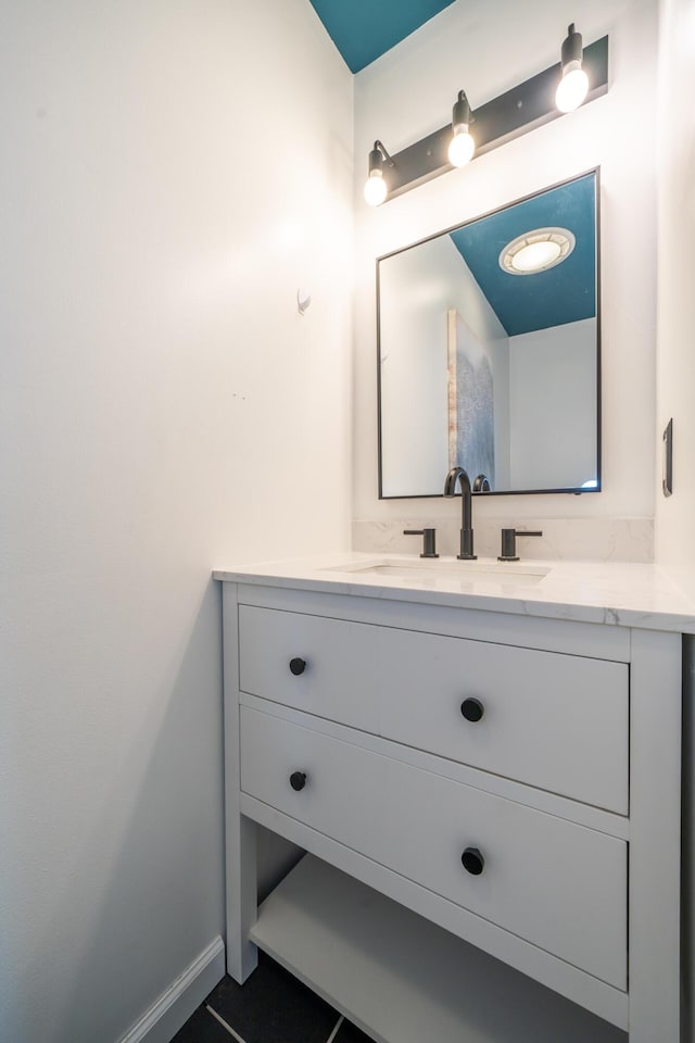 4100 Joshane St, Springfield, OH 45502 - bathroom featuring baseboards and vanity