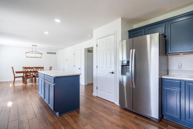 4100 Joshane St, Springfield, OH 45502 - kitchen featuring blue cabinets, stainless steel fridge with ice dispenser, and a center island