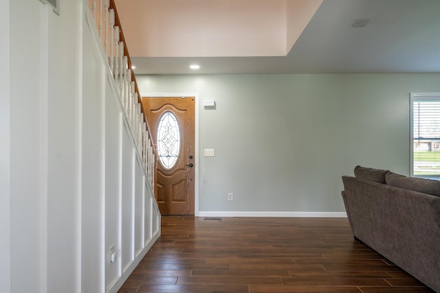 4100 Joshane St, Springfield, OH 45502 - foyer entrance featuring visible vents, baseboards, recessed lighting, stairs, and dark wood-type flooring