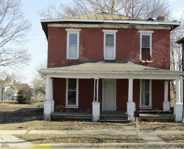 italianate home with a porch