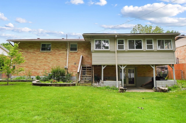 1306 Kercher St, Miamisburg, OH 45342 - back of house featuring brick siding, a patio area, and stairway
