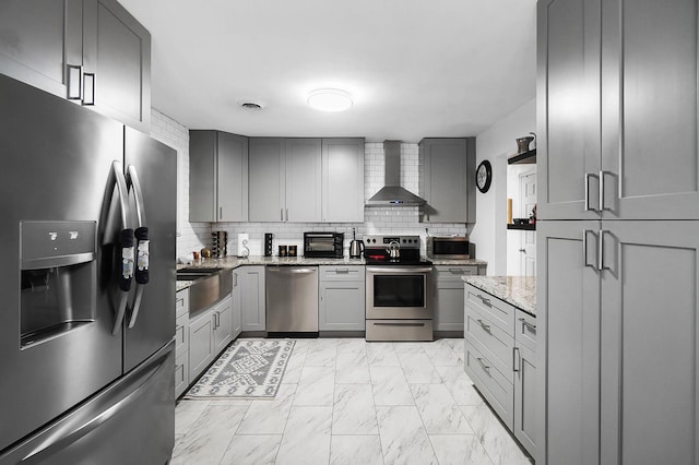 1306 Kercher St, Miamisburg, OH 45342 - kitchen with appliances with stainless steel finishes, wall chimney range hood, light marble finish flooring, gray cabinetry, and a sink