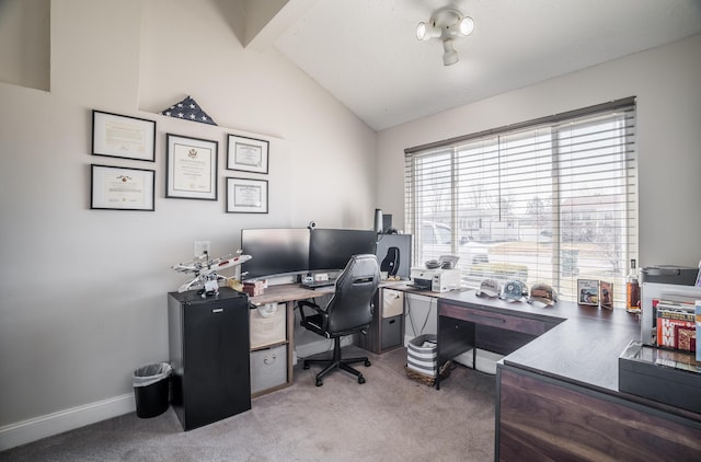 office area with light colored carpet, lofted ceiling with beams, and baseboards