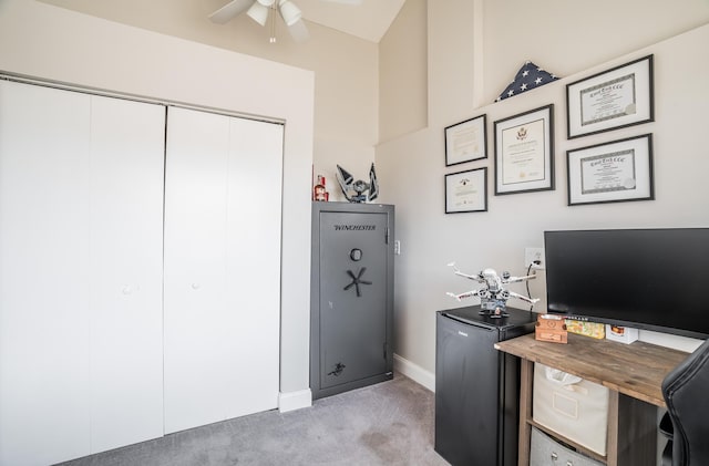 office area with light colored carpet, baseboards, and ceiling fan