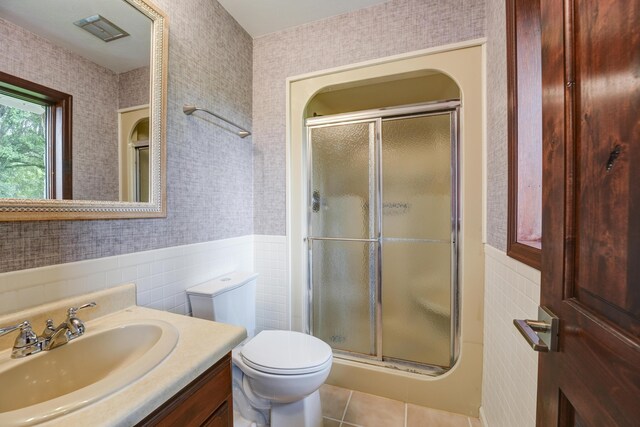 5341 Riffle Rd, Ansonia, OH 45303 - full bathroom with wallpapered walls, a shower stall, vanity, wainscoting, and toilet