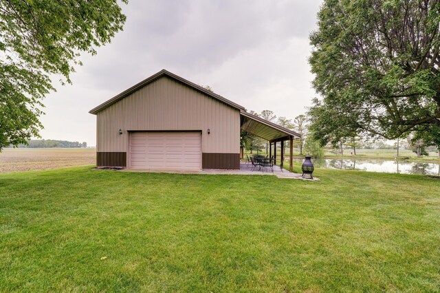 5341 Riffle Rd, Ansonia, OH 45303 - garage featuring a detached garage and a water view