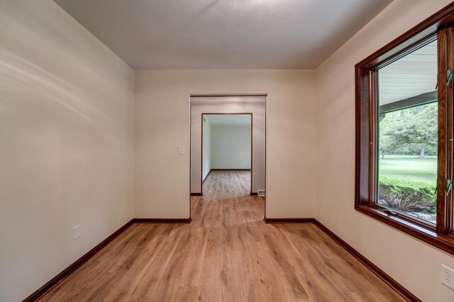 5341 Riffle Rd, Ansonia, OH 45303 - empty room with light wood-style flooring and baseboards