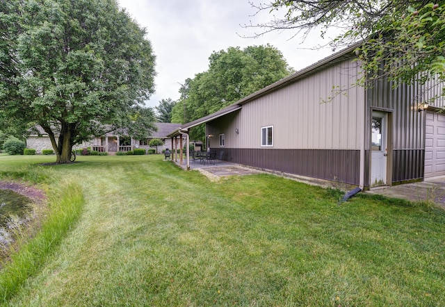 5341 Riffle Rd, Ansonia, OH 45303 - view of green lawn with a patio area