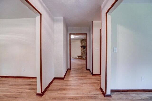 5341 Riffle Rd, Ansonia, OH 45303 - corridor with light wood-type flooring and baseboards