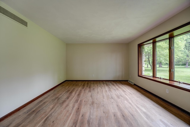 5341 Riffle Rd, Ansonia, OH 45303 - spare room with wood finished floors and baseboards