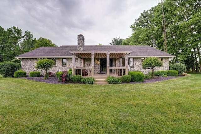 5341 Riffle Rd, Ansonia, OH 45303 - view of front of home with stone siding, a pergola, a chimney, a front lawn, and a deck