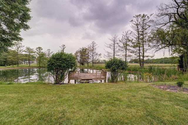 5341 Riffle Rd, Ansonia, OH 45303 - view of grassy yard with a deck with water view
