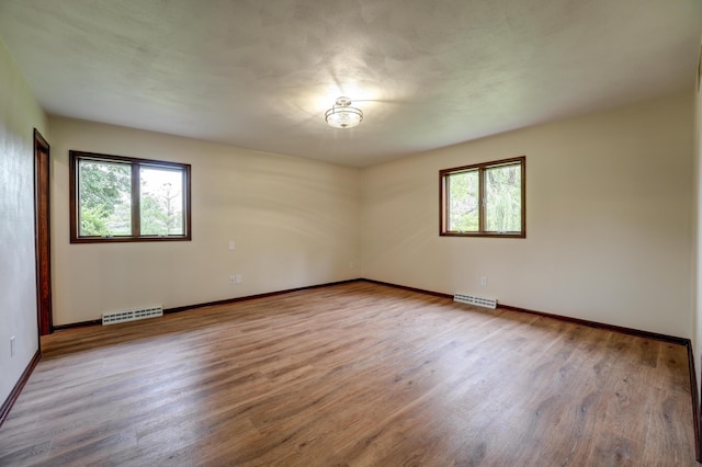 5341 Riffle Rd, Ansonia, OH 45303 - unfurnished room featuring wood finished floors and baseboards